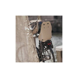 Urban Iki TA-KE rear child seat mounted on e-bike frame, designed for safe and comfortable child riding accessory.