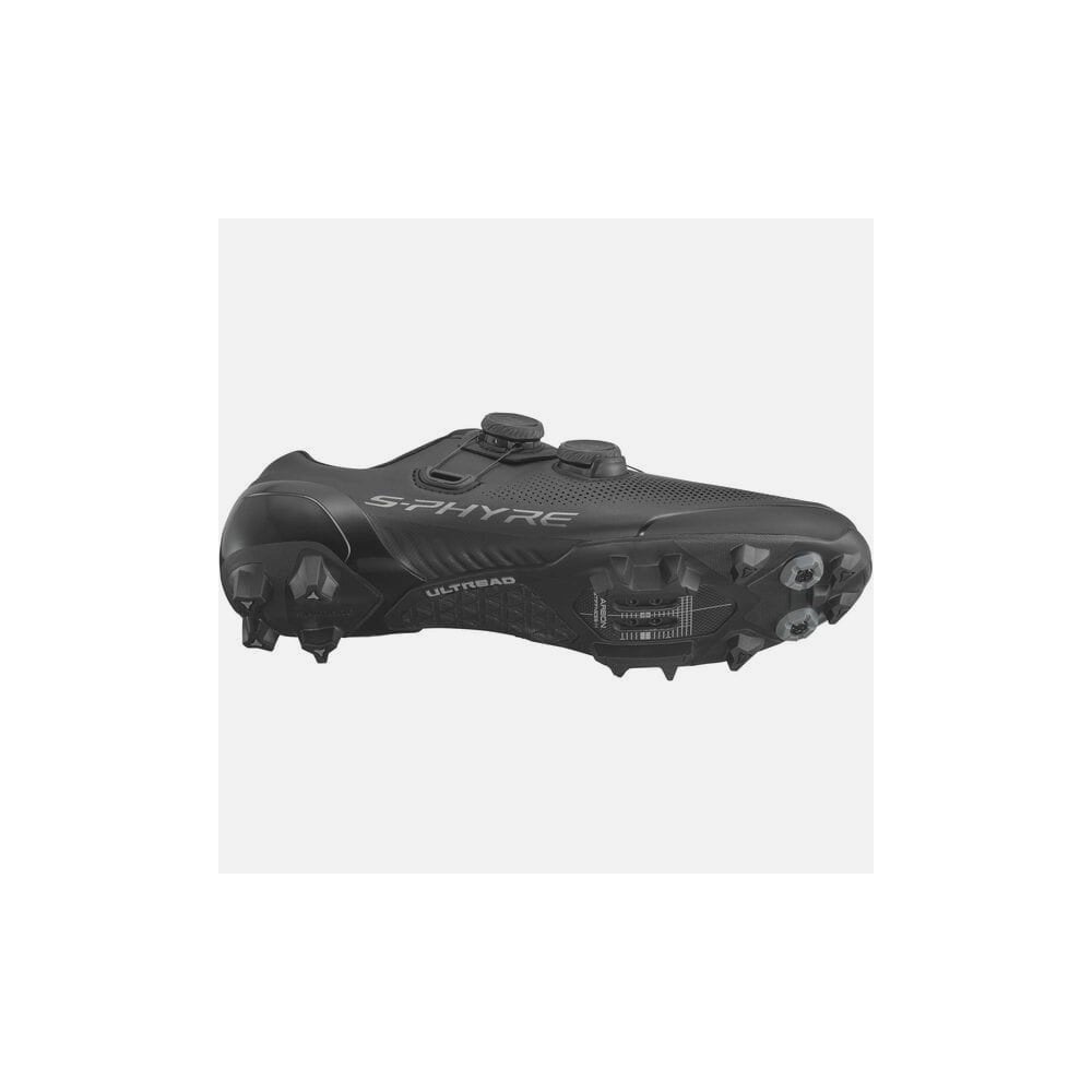 Shimano S-PHYRE XC9 MTB shoes for cross-country riding, featuring black and grey design with Shimano branding.