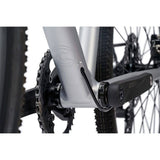 Cinelli Zydeco Silver Bootleg gravel bike with front rack, designed for urban commuting and mixed terrain riding.