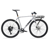 Cinelli Zydeco Silver Bootleg gravel bike with front rack, designed for urban commuting and mixed terrain riding.