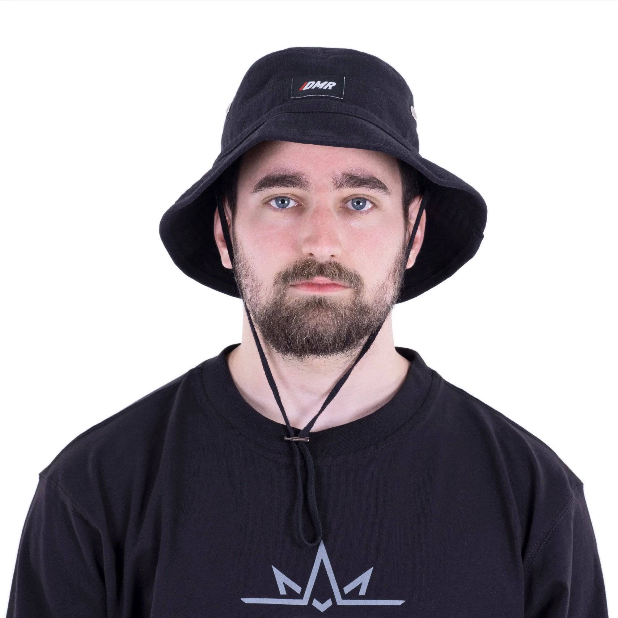 Black DexShell windproof skull cap, breathable and stretchable helmet-compatible headwear for outdoor activities.