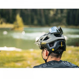 Mavic Deemax MIPS mountain bike helmet with enhanced protection and ventilation, shown in a natural outdoor setting.