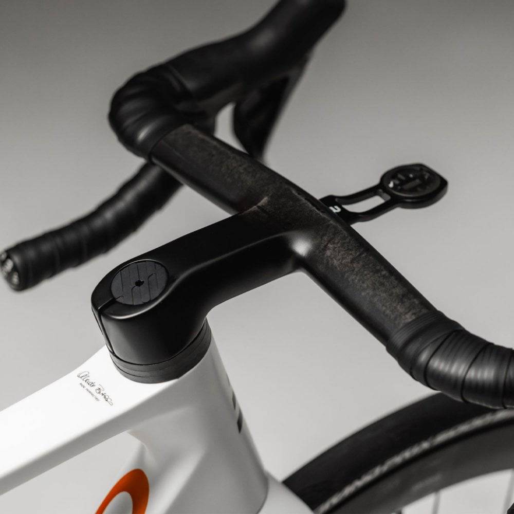 Basso SV Burano white road bike frameset with integrated handlebars and aerodynamic design, viewed from side angle.