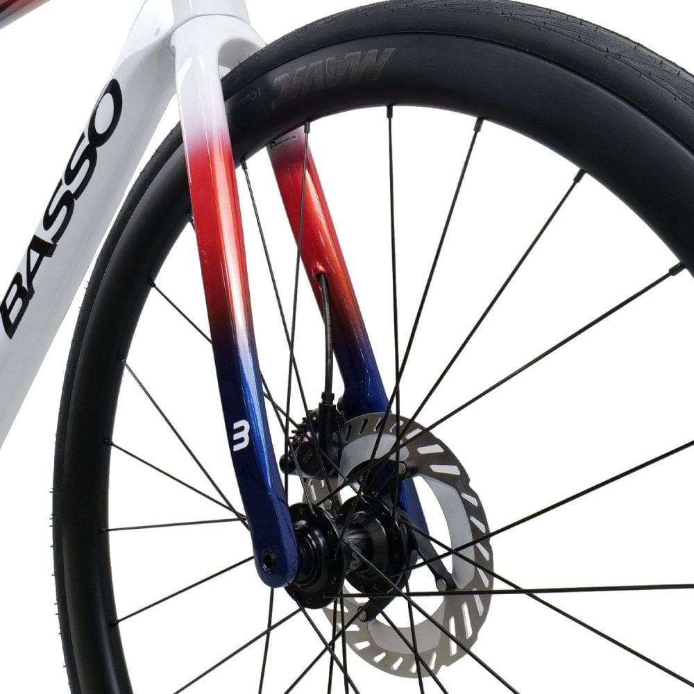 Basso Astra 105 Di2 all-road bike with Cosmic S Chroma White frame, drop handlebars, and sleek design for versatile riding.