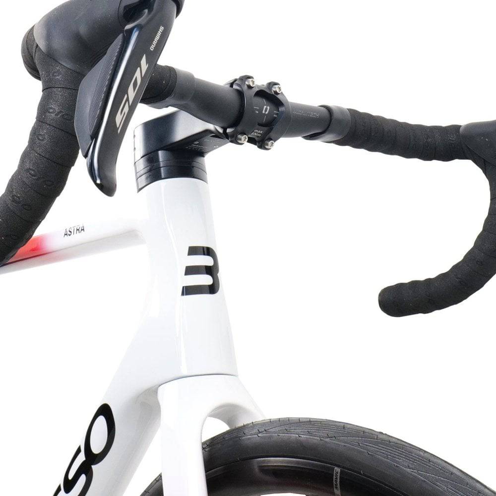 Basso Astra 105 Di2 all-road bike with Cosmic S Chroma White frame, drop handlebars, and thin tires for versatile riding.