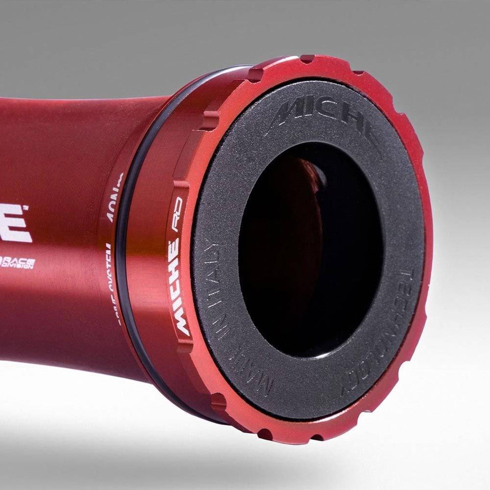 Miche Integrale RD press-fit bottom bracket with 24mm axle and CeramicSpeed bearings for high-performance bike components.
