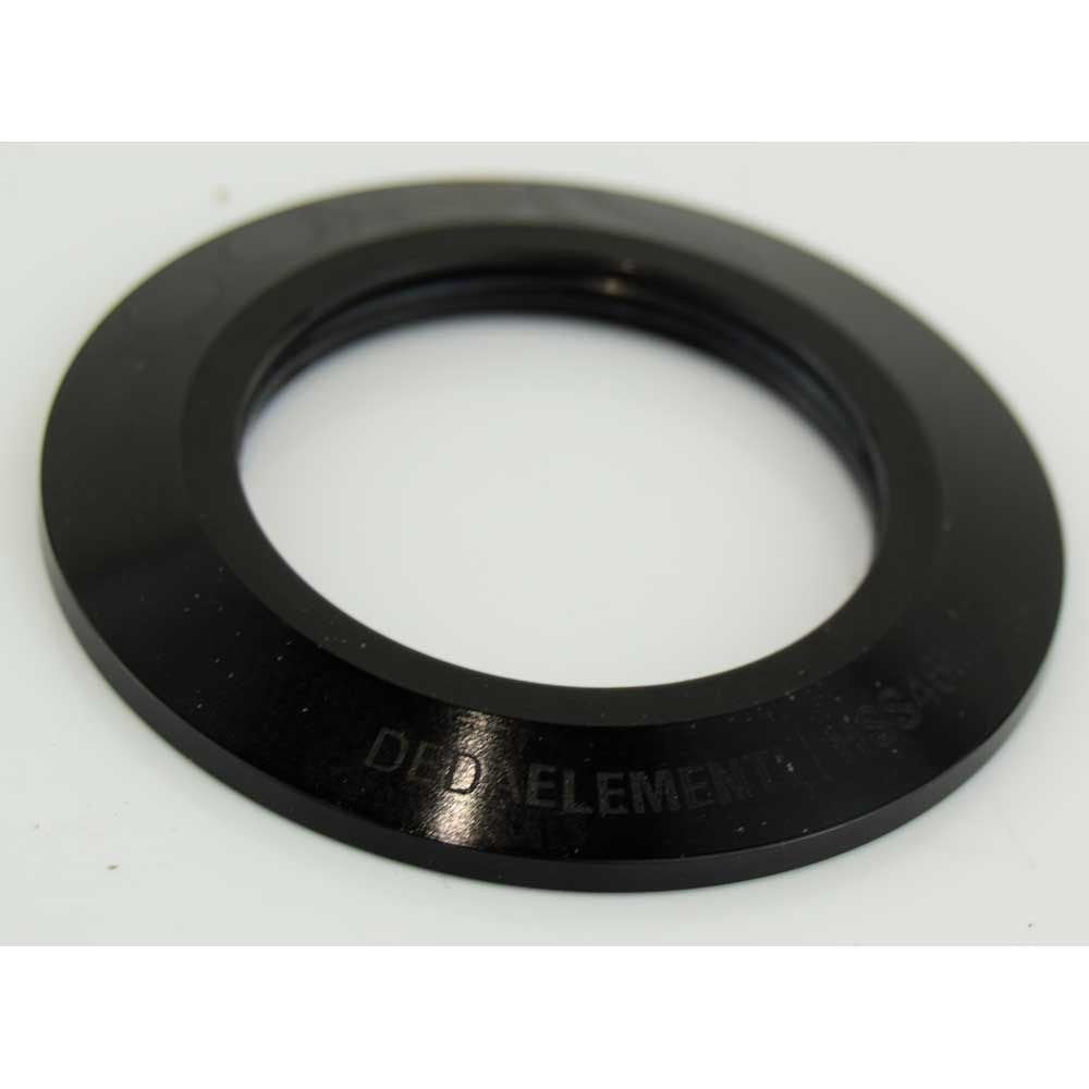 Deda headset topcover spare accessory for carbon and alloy headsets, showing black protective component with branding details.
