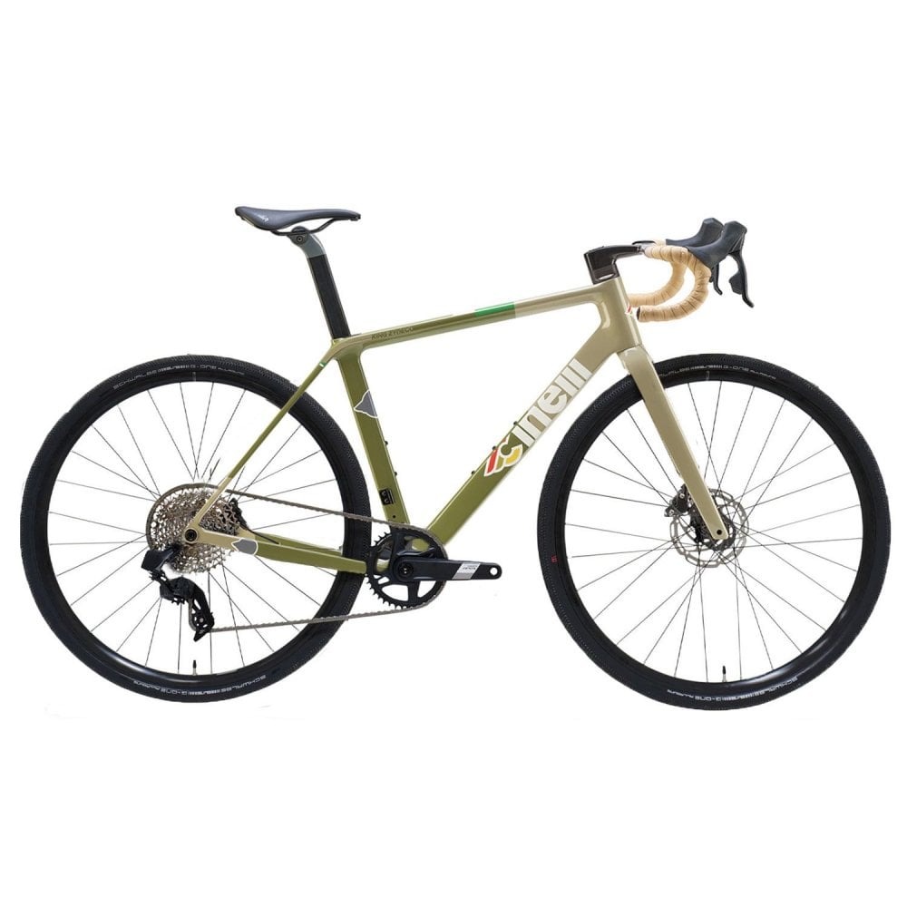 Cinelli King Zydeco II gravel bike with adjustable fork and SRAM Apex Xplr components, featuring knobby tires and a lightweight frame.