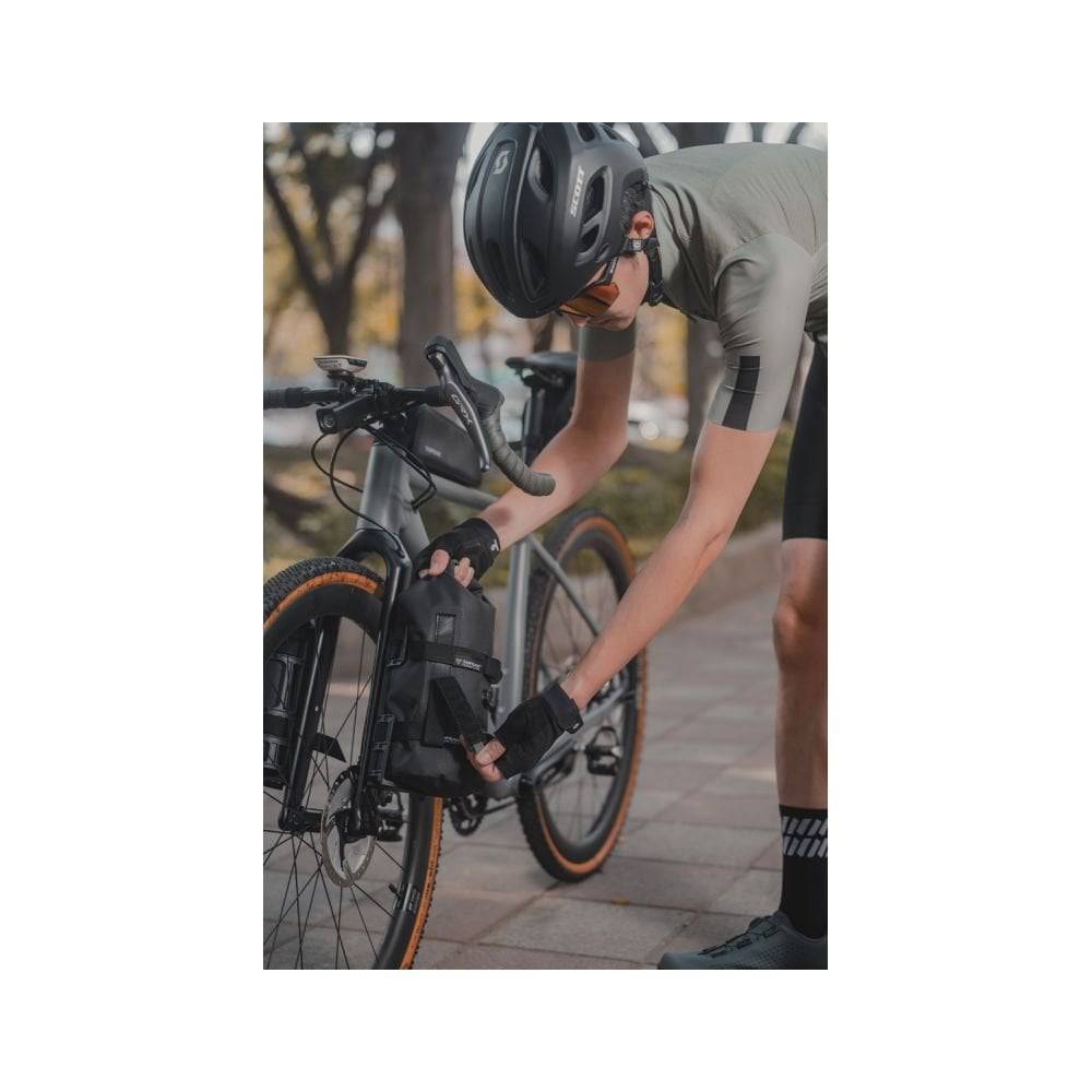Topeak Fork Drybag 4L weatherproof bikepacking bag mounted on a bike fork for Versacage mount in black.