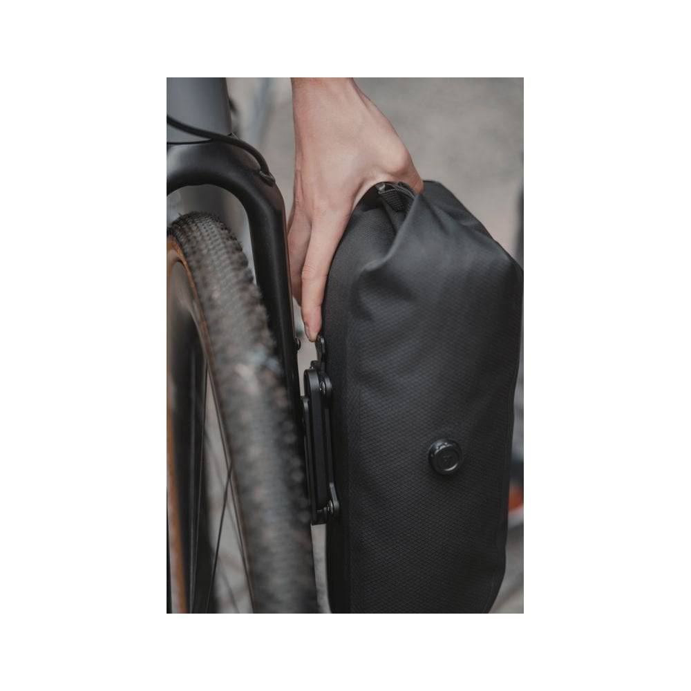 Topeak QR Fork Drybag 5.8L black waterproof bikepacking accessory attached to a bike fork.