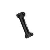 Topeak Cage Mount Expander in black for water bottle cages and pump brackets, accessory for bike hydration and pump storage.