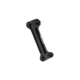 Topeak Cage Mount Expander black accessory for water bottle cages and pump brackets, designed for versatile bike storage.