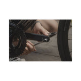 Topeak Ratchet Rocket Essential HD multi-tool in black showing 15 functions and compact design for bike workshop use.