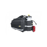 Topeak MTS TrunkBag EX 8L black bike rack bag with Velcro mounting system, weather-resistant cycling accessory on a bike.