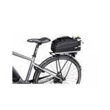 Topeak MTS TrunkBag EX 8L black bike rack bag with Velcro mounting system, weather-resistant cycling accessories.