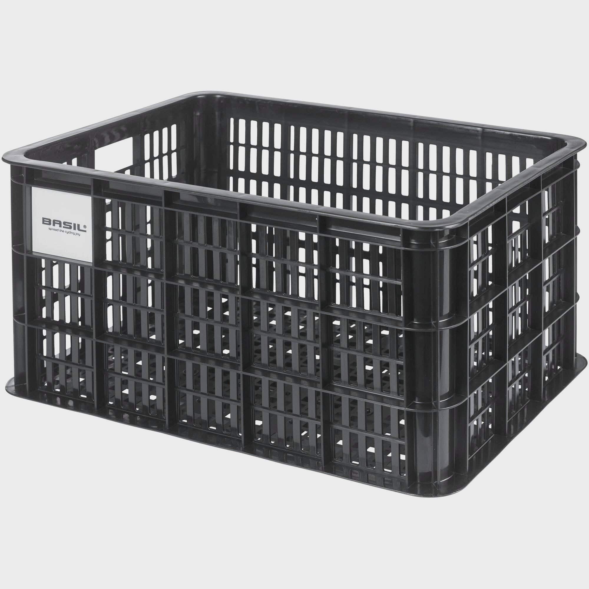 Large Basil Basil Bicycle Crate MIK 40L black recycled synthetic bike basket attached to a bicycle for carrying goods.