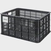 Large Basil Basil Bicycle Crate MIK 40L black recycled synthetic bike basket attached to a bicycle for carrying goods.
