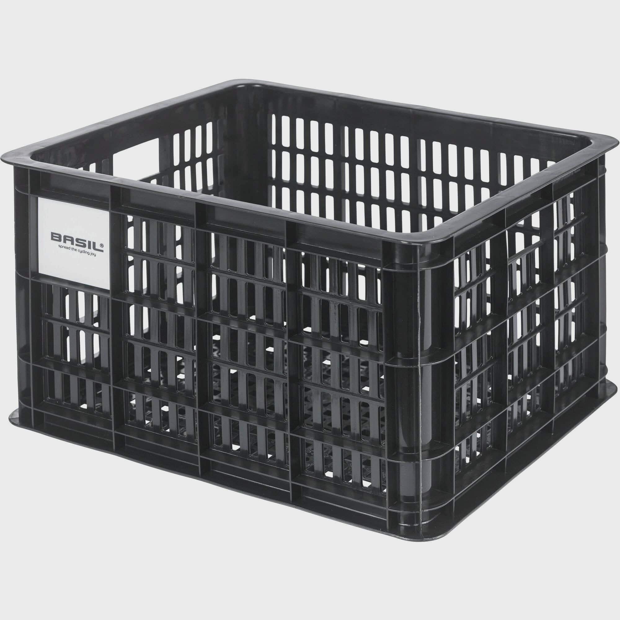 Black Basil Bicycle Crate MIK Medium 29.5L recycled synthetic bike basket attached to a bicycle for carrying belongings.