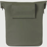 Basil City bicycle shopper bag in moss green with reflective details, hook-on system, and 14-16L capacity for accessories.