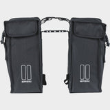 Black Basil distance holder for double panniers with rear light mount, accessory for bike racks and luggage.