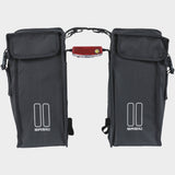 Black Basil distance holder accessory for double panniers with rear light mount, designed for bike luggage and accessories.