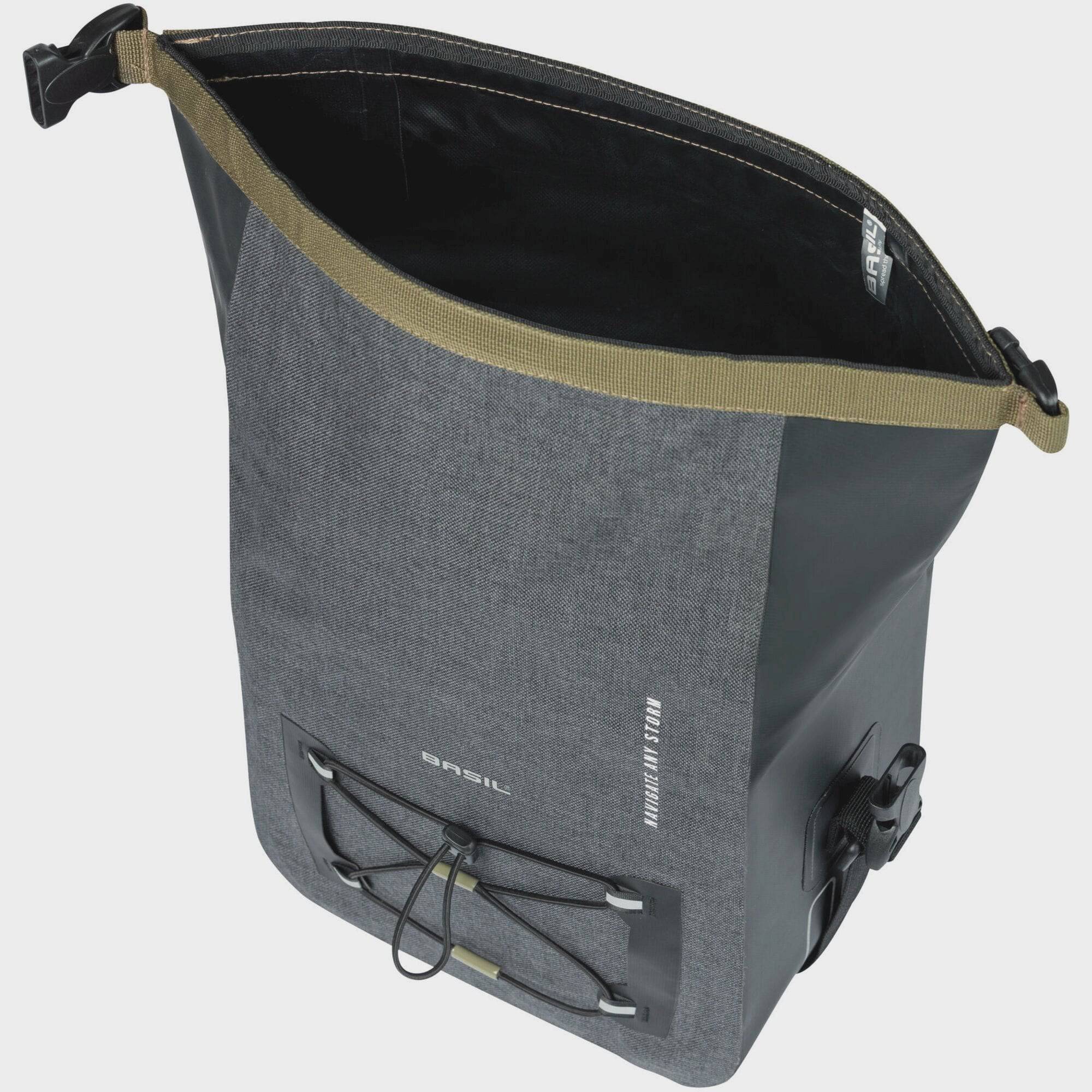 Black Basil Navigator Storm KF handlebar bag with reflective logos, waterproof 10-11L cycling accessories mounted on a bike handlebar.