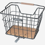 Black and natural brown Basil Norland MIK 23L bicycle basket, front and rear carrier compatible, shown attached to bike.