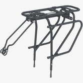 Basil Universal Cargo Carrier MIK STUDS in matte black attached to a 26-29 inch bike, showcasing bike rack accessories.