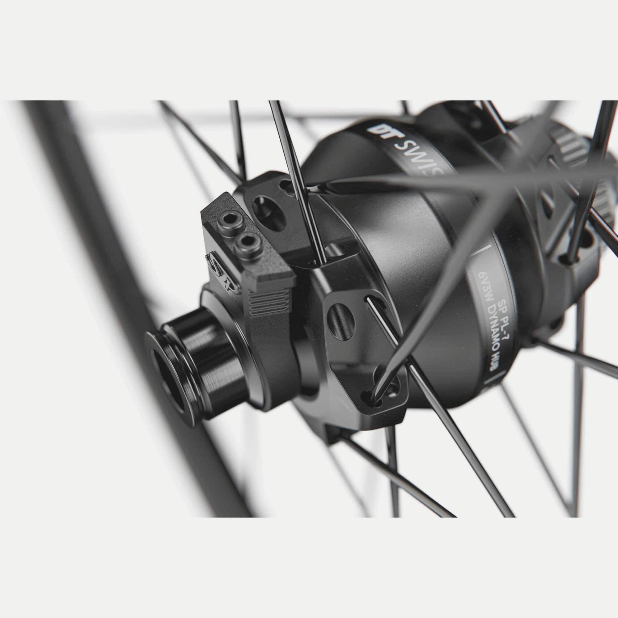 DT Swiss G 1800 SPLINE 700c front disc brake dynamo wheel with clincher tires and 25x24mm rim width, designed for bike components