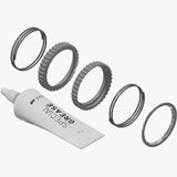 DT Swiss ratchet service and upgrade kit with 72 teeth and grease for DEG hubs, showcasing components and tools.