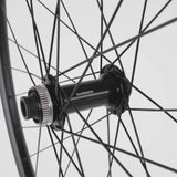 M Part Wheels M25 v2 29-inch boost front MTB wheel with tubeless-ready hub and 110x15mm axle, designed for mountain biking.