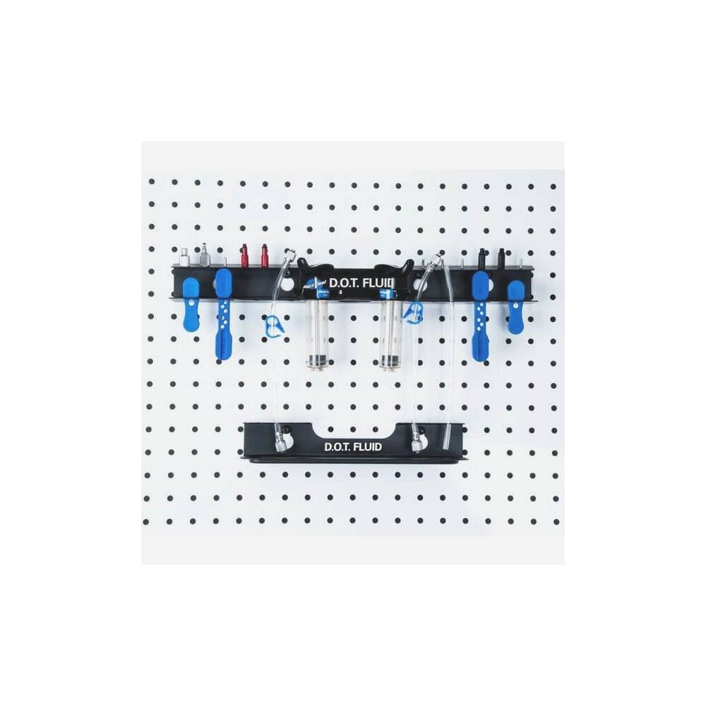 Wall-mounted Park Tool JH-4 bleed kit organiser for hydraulic brake accessories, ideal for workshop storage and organization.