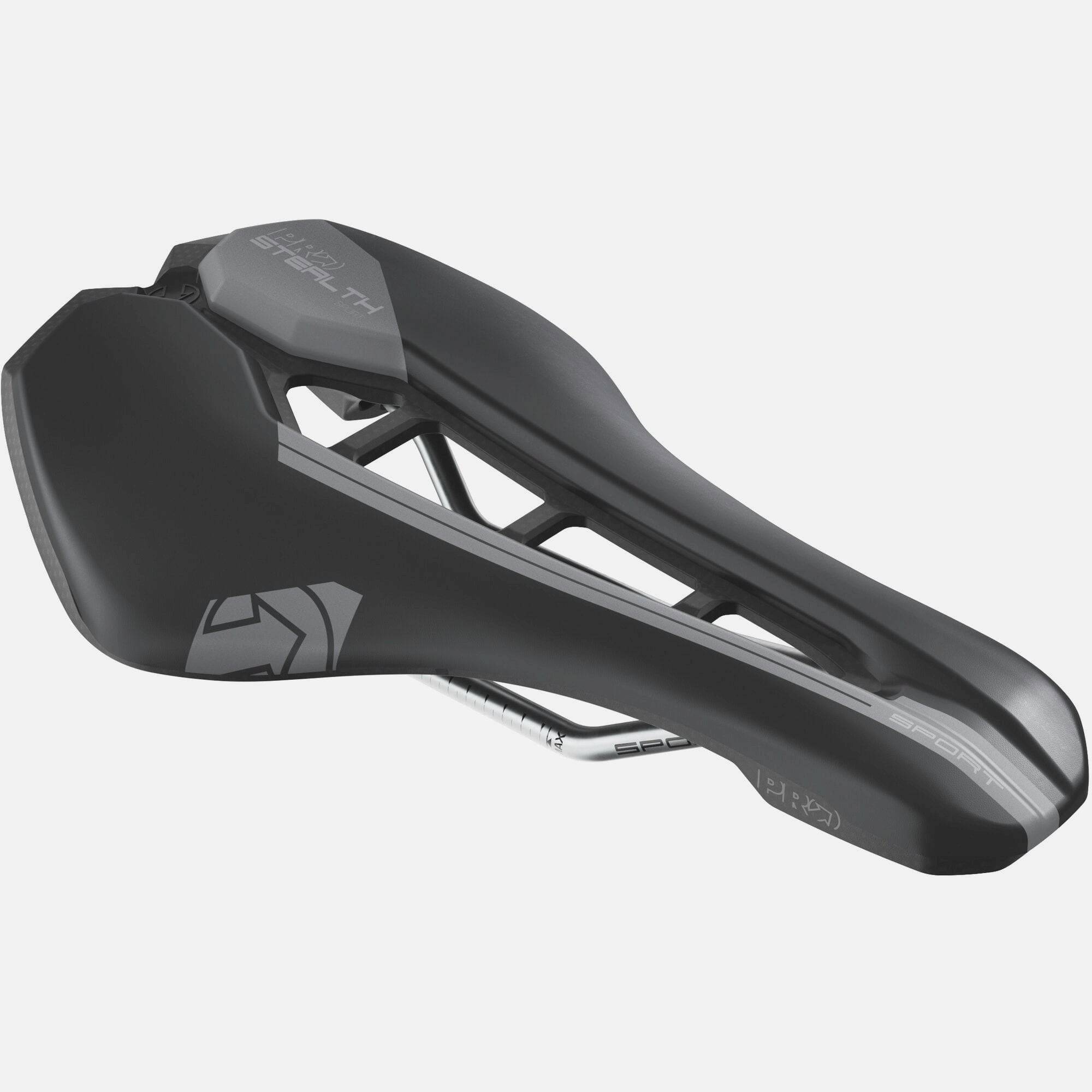 PRO Stealth Sport cycling saddle with ergonomic design and carbon reinforcement, shown mounted on a bike seat.