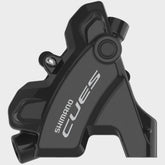 Shimano CUES BR-U6030 rear flat mount brake caliper in black, component with mounting hardware, no rotor adapter included.