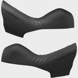 Pair of Shimano GRX ST-RX610 bracket covers for shifter components, genuine replacement parts for bike gear shifters.