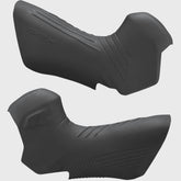 Shimano GRX ST-RX825 shifter bracket covers pair, genuine replacement components for bike shifters, black plastic.