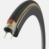 Vittoria Corsa Pro 700x30c black clincher road bike tire with tan sidewalls, tubeless-ready for high-performance cycling.