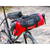 Zefal Z Adventure F10 waterproof bikepacking handlebar bag with 10L capacity, mounted on a bicycle handlebar for outdoor cycling.