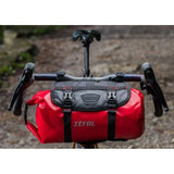 Zefal Z Adventure F10 waterproof bikepacking handlebar bag with 10L capacity mounted on a bicycle handlebar.