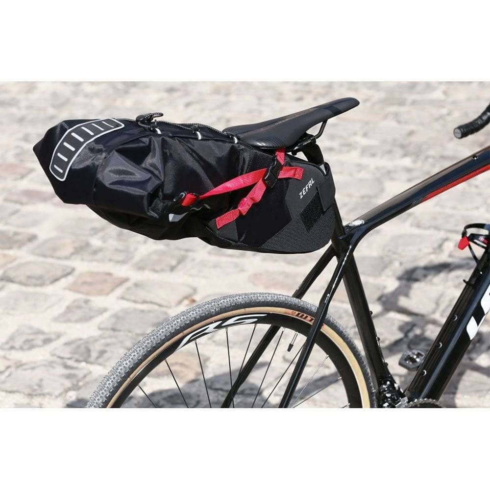 Zefal Z Adventure R11 waterproof bike saddle bag attached to a bike, designed for touring and cycling, 5-11L capacity.