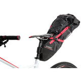 Zefal Z Adventure R17 bikepacking saddle bag mounted on bike, waterproof, adjustable 8-17L capacity, accessory for cycling gear.
