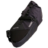 Zefal Z Adventure R5 5L waterproof bikepacking saddle bag attached to a bicycle seat for cycling storage and gear.
