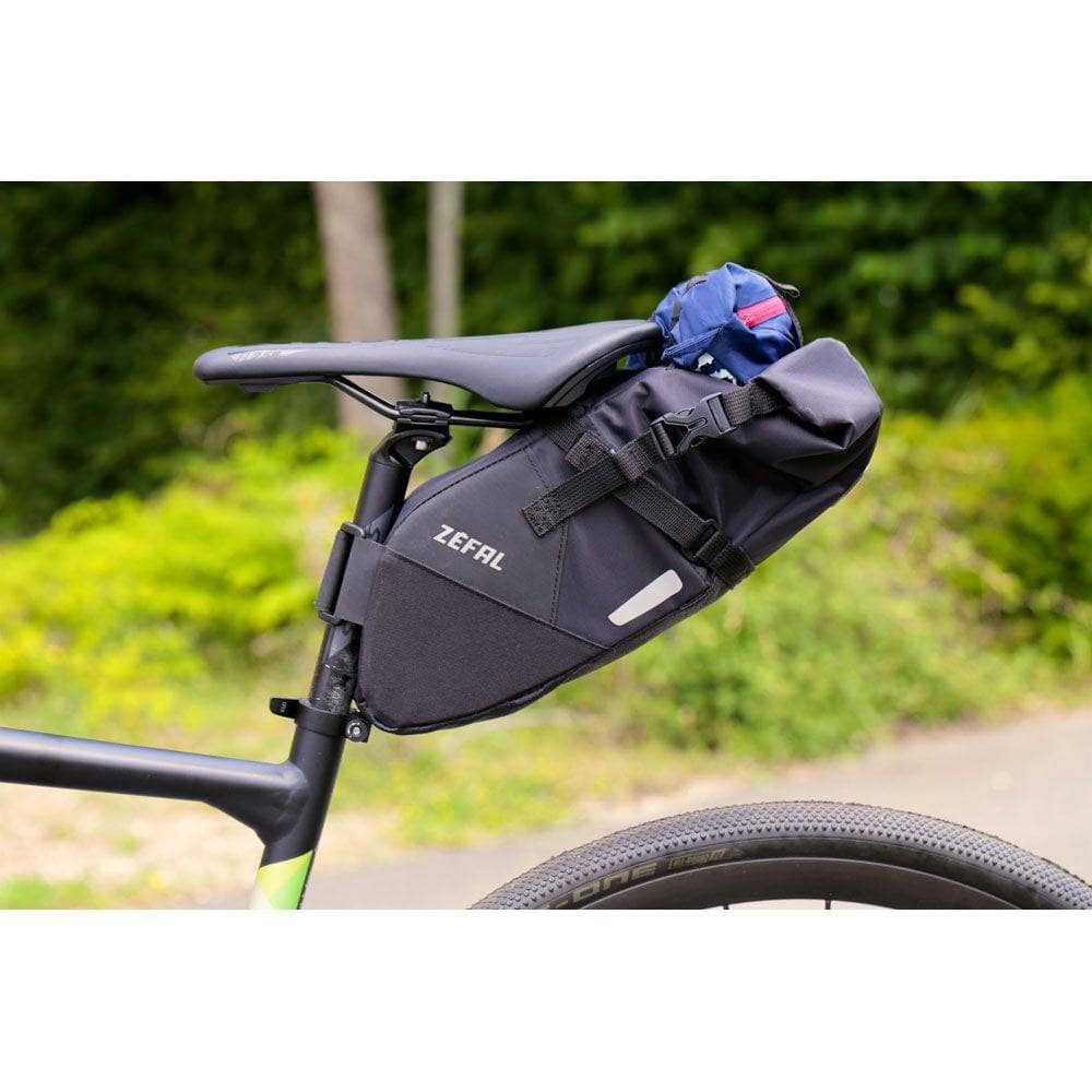 Zefal Z Adventure R5 5L waterproof bikepacking saddle bag attached to bicycle saddle for cycling gear storage.