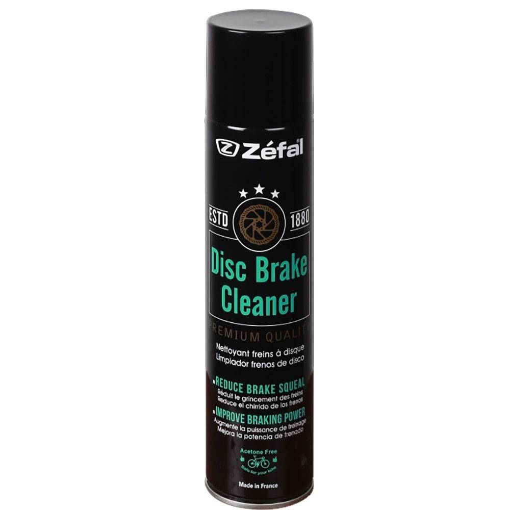 Zefal Disc Brake Cleaner 400ml in a workshop setting, showing the fast-drying degreaser spray for bike brakes.