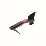 Zefal Clean Brush 3-in-1 bike cleaning tool for chain, freewheel, and derailleur in a workshop setting