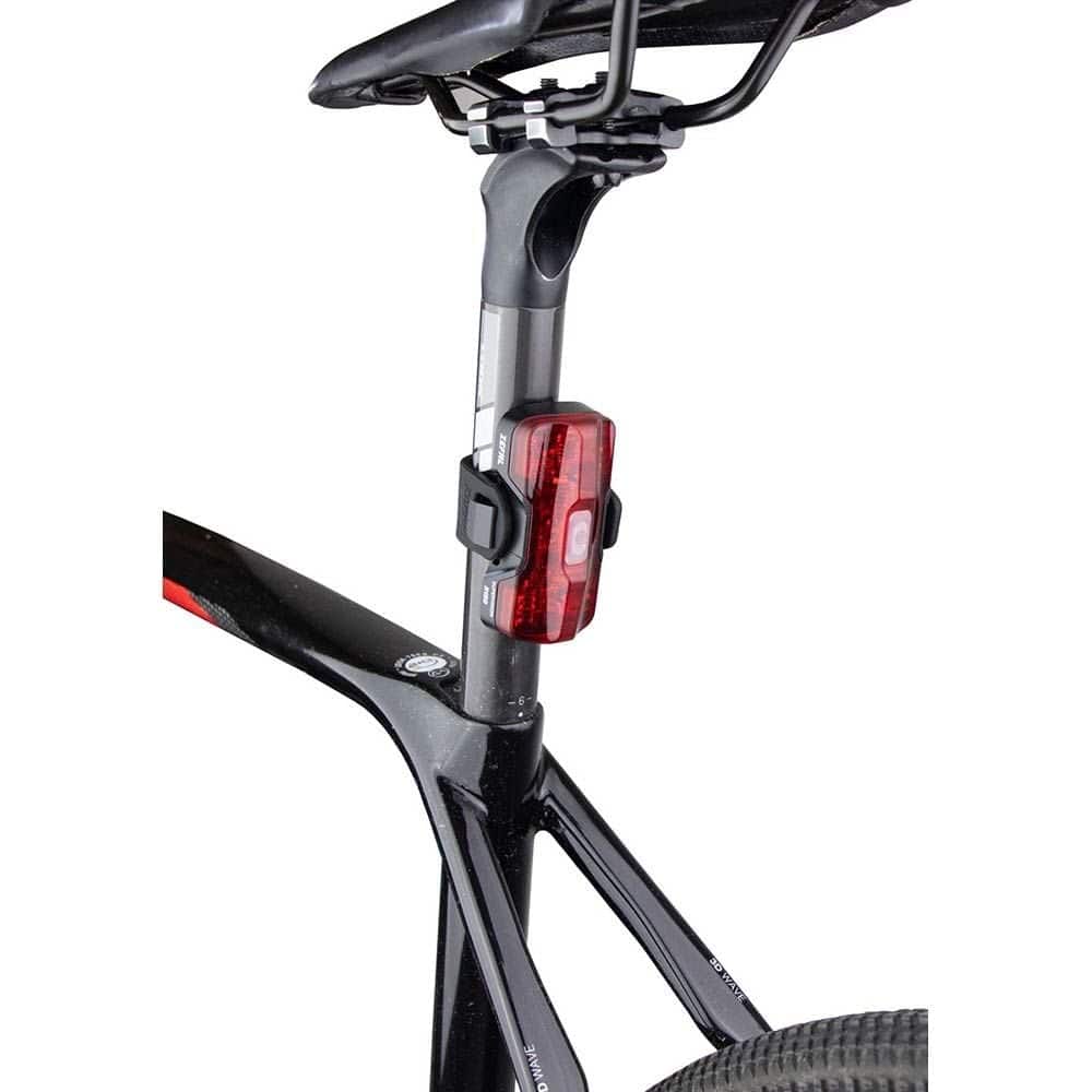 Zefal Supervision R150 & F200 bike light set with front and rear lights, USB-C rechargeable bike accessories, mounted on a bike.
