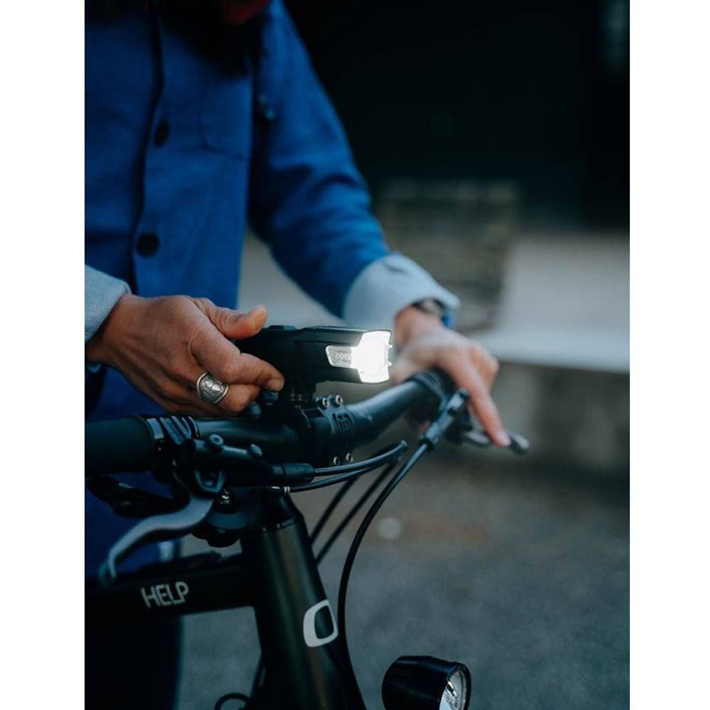 Zefal Supervision R150 and F200 bike light set with front and rear USB-C rechargeable bike lights, mounted on a bicycle.