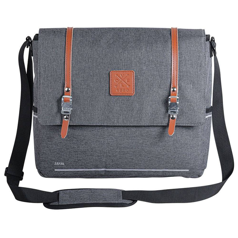 Zefal Urban Messenger Pannier Bag on bike rear rack with rain cover, 11L capacity, waterproof cycling accessories.