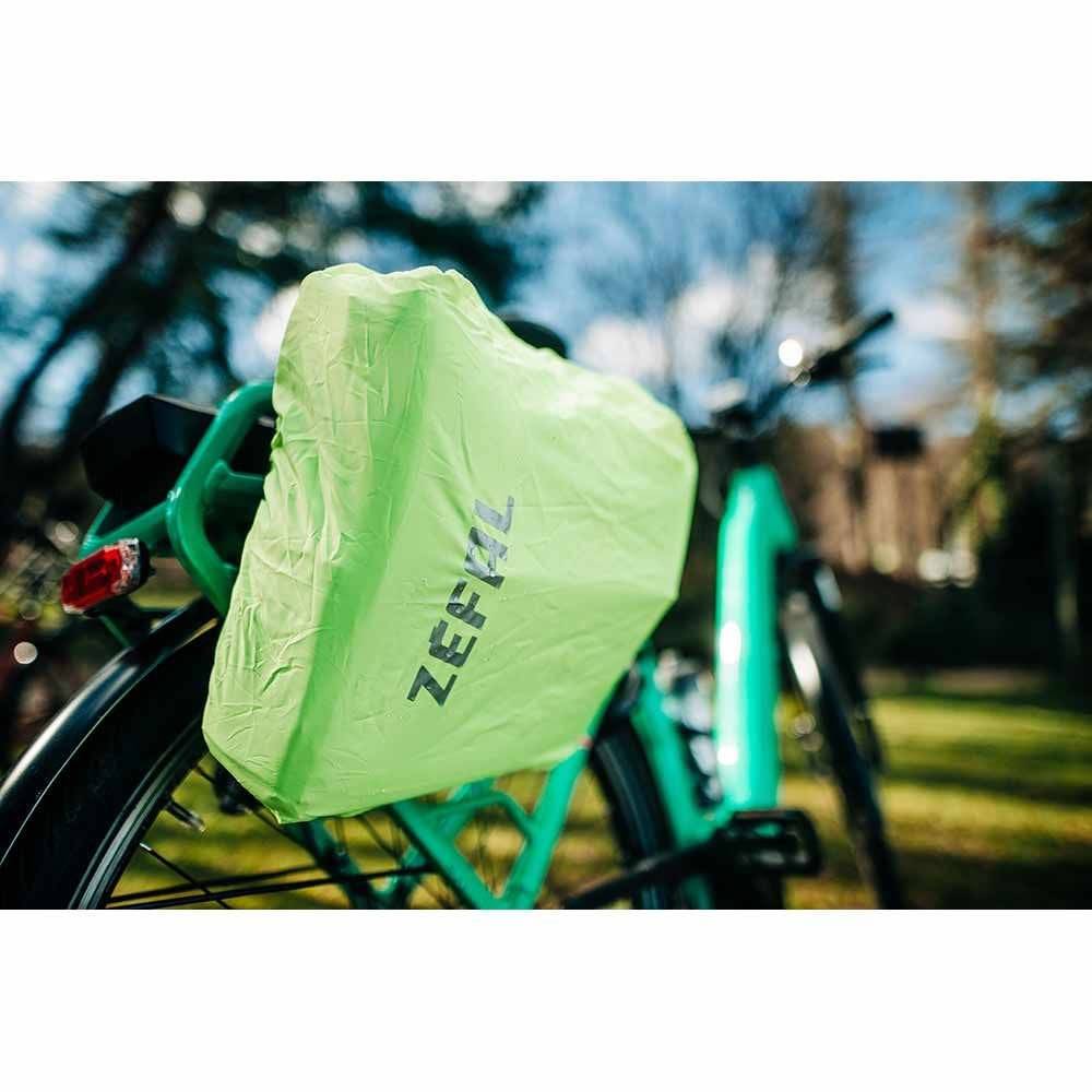 Zefal Urban Messenger Pannier Bag on bike rear rack, 11L capacity with rain cover for urban cycling accessories.