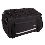 Zefal Z Traveller 40 bike rack bag with waterproof cover and reflective strips, attached to a bike for carrying accessories.